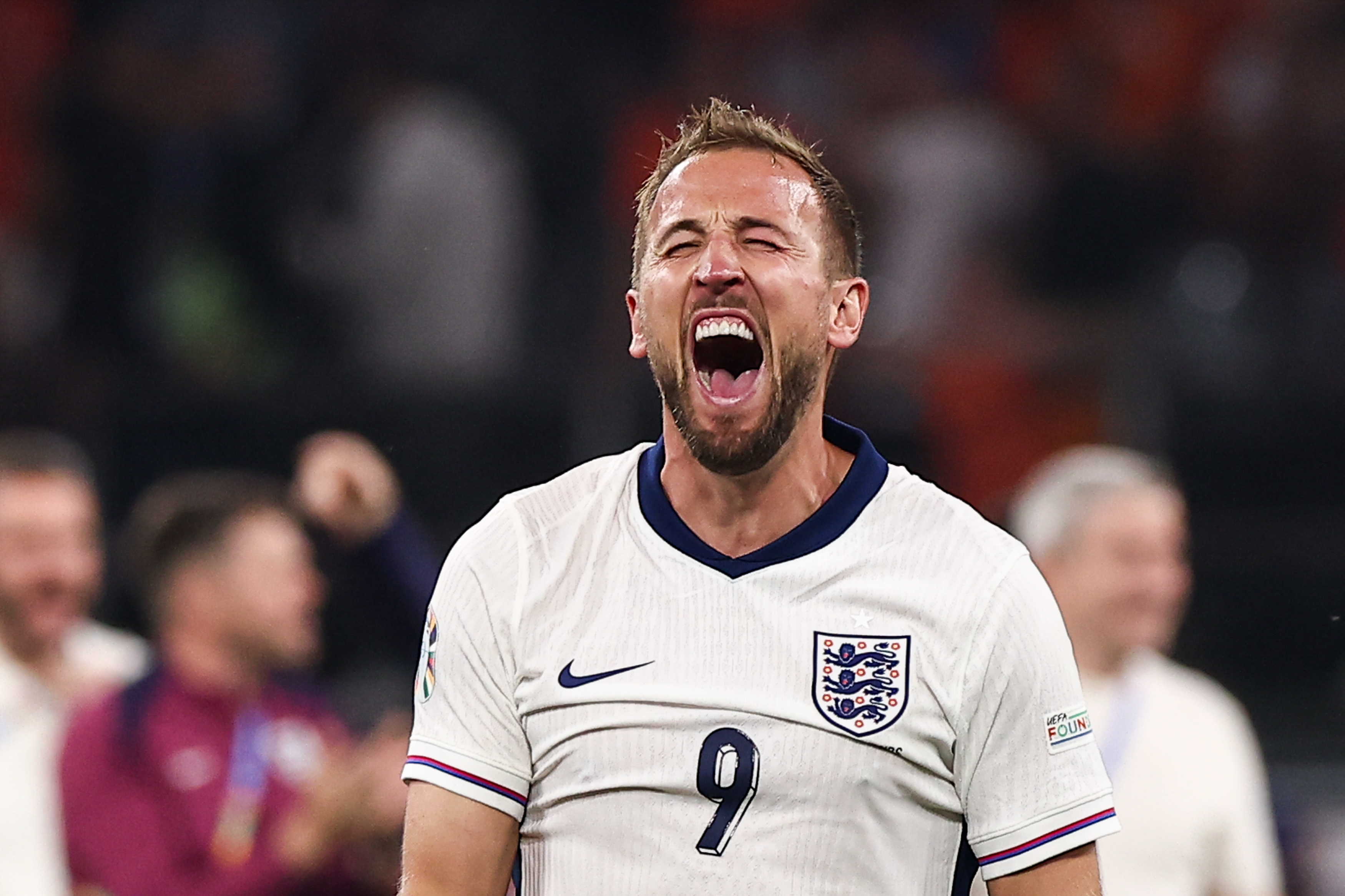 Harry Kane of England celebrates after scoring a goal during...