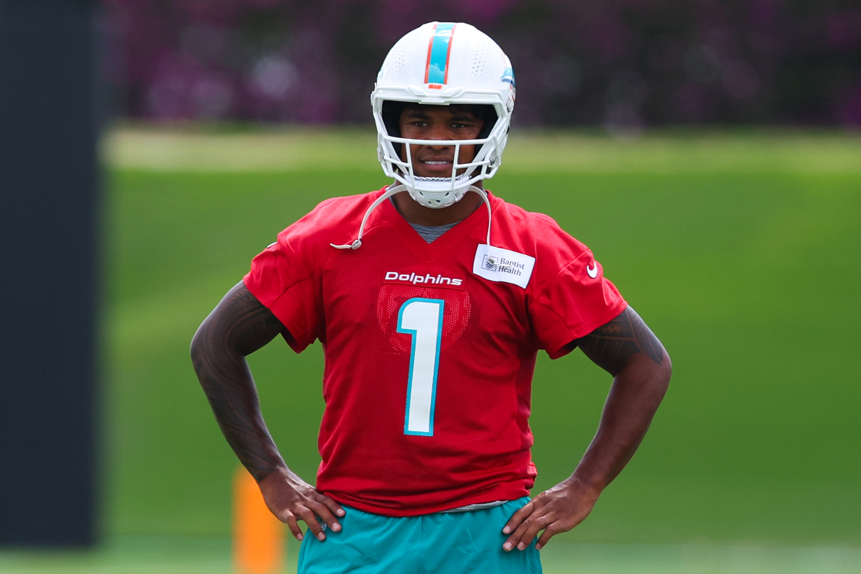 Tua Tagovailoa #1 of the Miami Dolphins looks on during Miami Dolphins Mandatory Minicamp on June 04, 2024 in Miami Gardens, Florida.