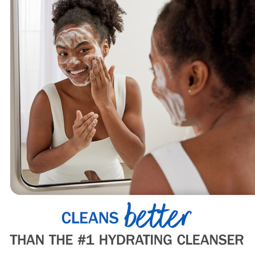 Cleans better than the #1 hydrating cleanser. Model applying Melts cleanser to face.