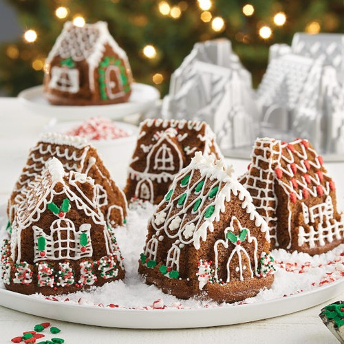 Gingerbread village from the Cozy Village Pan. Six gingerbread house decorated with colored icing for windows and doors.