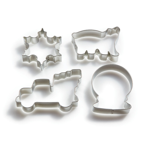 4 tin cookie cutters in the shapes of Polar Bear, Snow Globe, Snowflake, and Truck with Tree