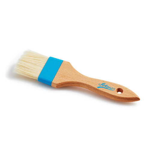 Pastry brush. tan colors wooden handle and light colored bristles. Blue stripe above bristles.