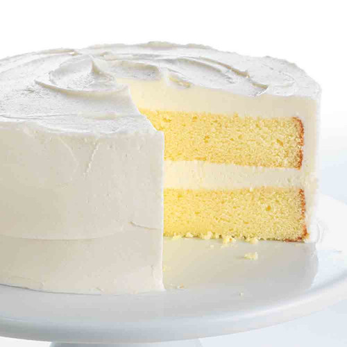 Round layer cake with vanilla frosting made with Gluten-Free Yellow Cake Mix