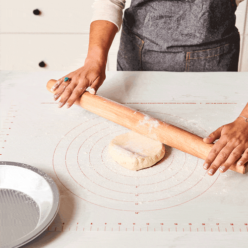 Demonstrating how to roll out dough on King Arthur Rolling Mat