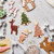 View Decorated Christmas Cheer cookies. Elf, deer, tree, and gingerbread house.