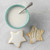 View White Icing Mix in a bowl with iced star cookies