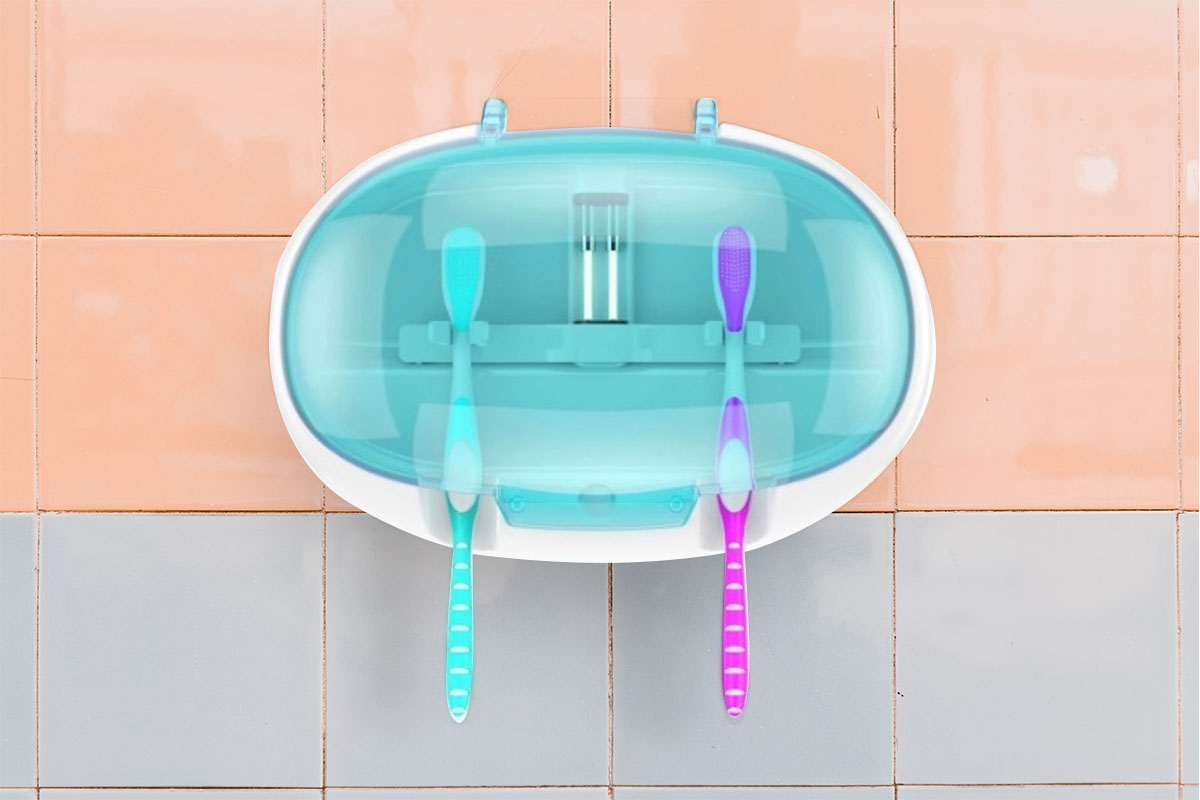 A wall mounted sanitizing toothbrush holder