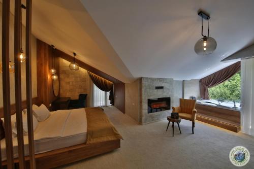 Un ou plusieurs lits dans un hébergement de l'établissement Resort Ujevara e Drinit