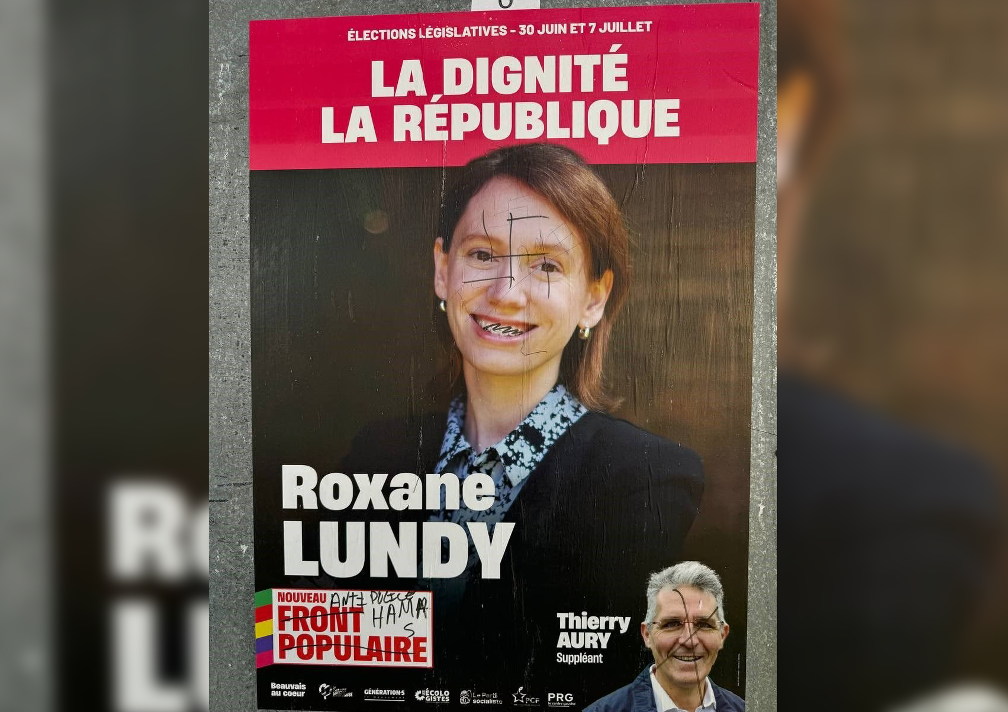 Beauvais (Oise), ce dimanche 30 juin. Des affiches de Roxane Lundy, candidate NFP, ont été taguées d'une croix gammée durant la nuit de samedi à dimanche.