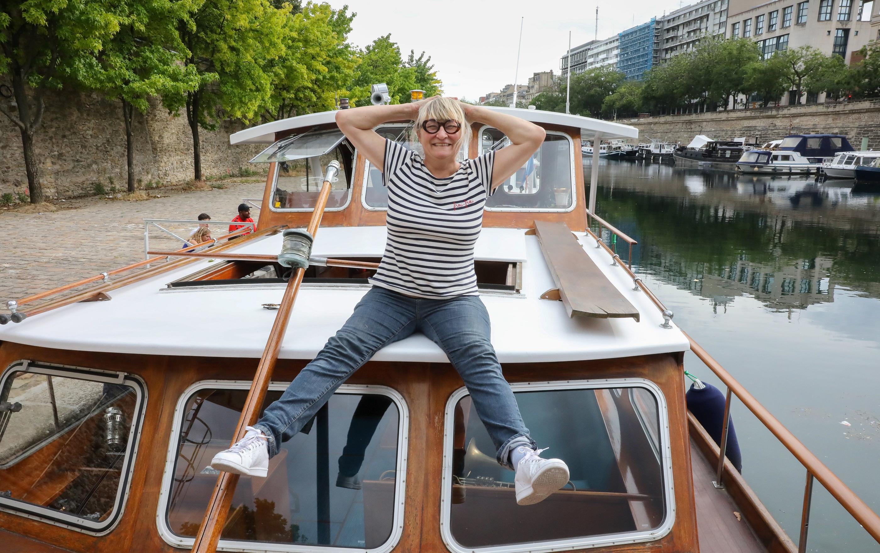 L'ex-animatrice Christine Bravo, reconvertie dans le tourisme fluvial, à bord du « Frou-frou », est fière de participer grâce à son bateau à la cérémonie d'ouverture des Jeux. LP/Aurélie Ladet