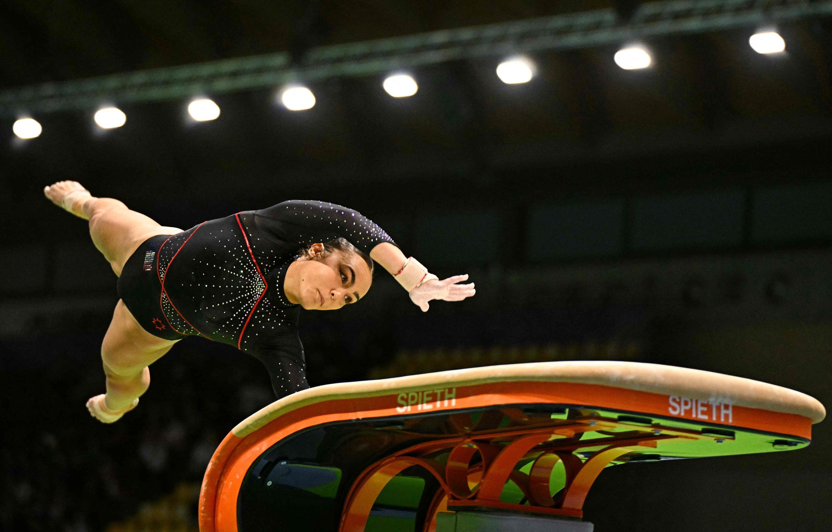 Coline Devillard a conservé son titre de championne d'Europe au saut ce samedi à Rimini (Italie). Sa coéquipière Ming Gherardi Van Eijken est troisième. GABRIEL BOUYS/AFP