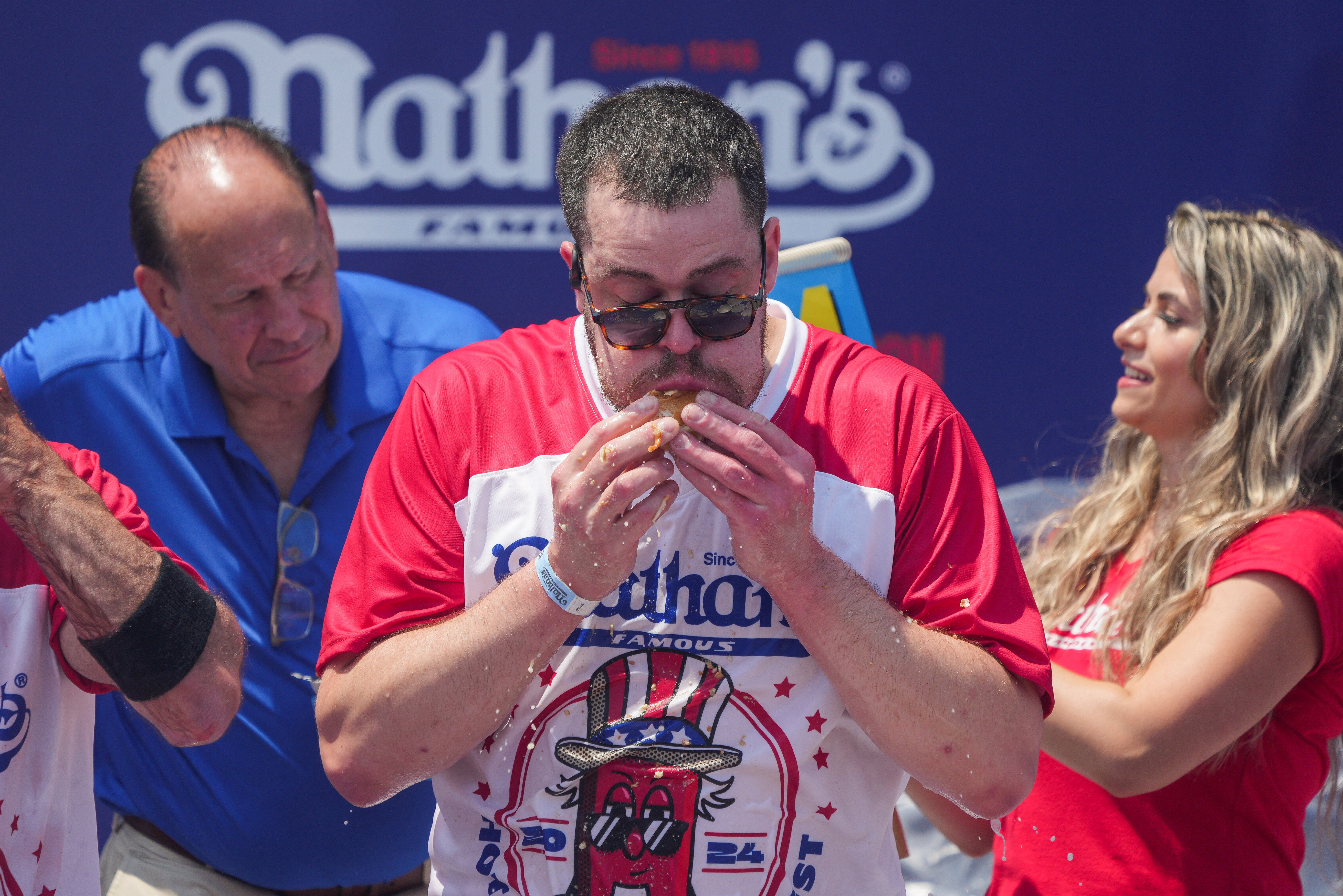 Competitive eaters vie for Nathan's hot dog eating contest victory