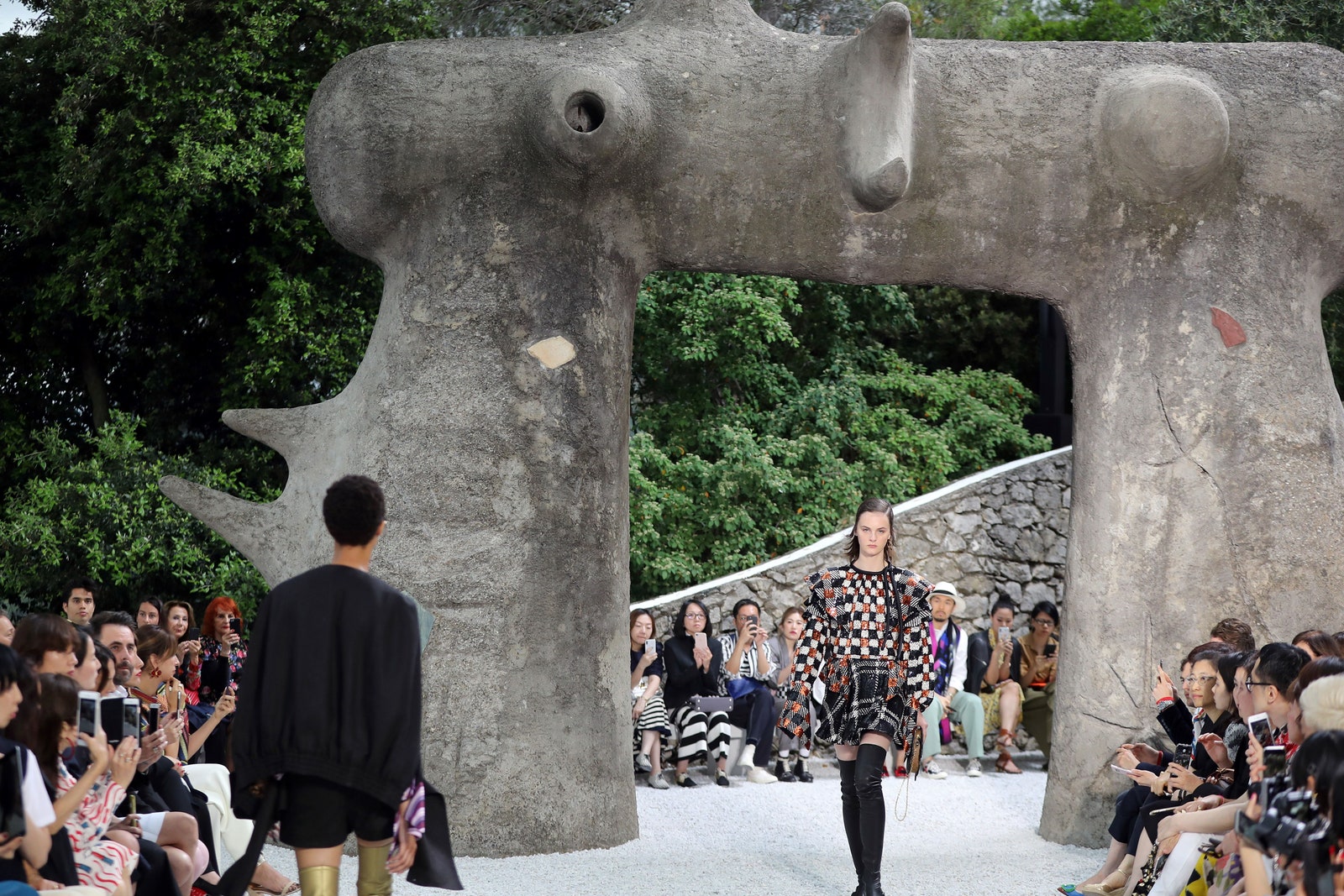 Models present creations during the Louis Vuitton Cruise 2019 collection fashion show at Maeght foundation in...