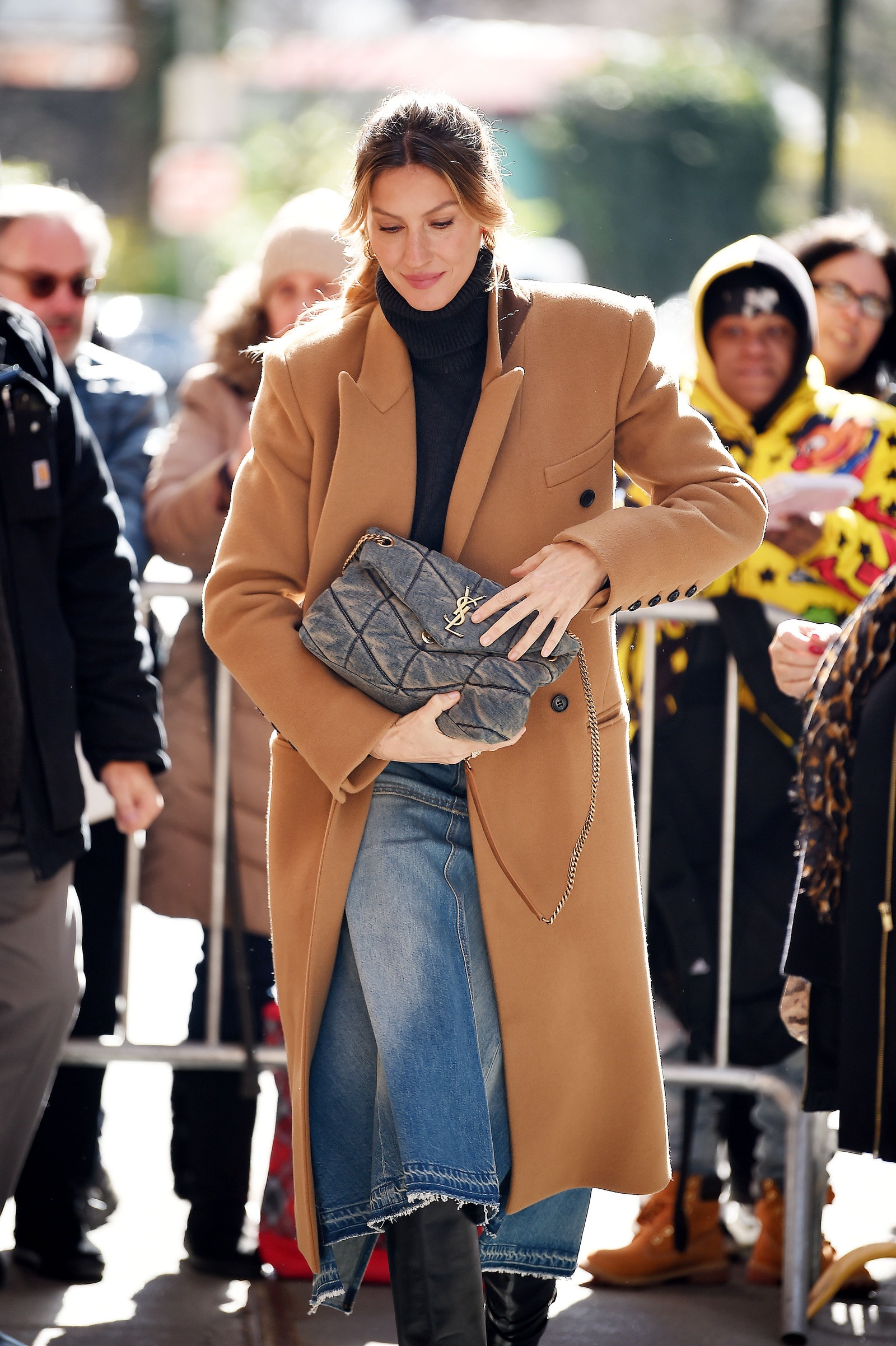 Image may contain Gisele Bündchen Clothing Coat Accessories Bag Handbag Person Glasses Adult Purse and Overcoat