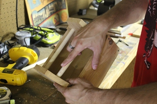 Vintage putting dowels in at this point drilling the end pieces to the bottom piece.