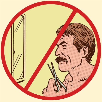 Man trimming handlebar mustache in front of mirror in a don't sign.