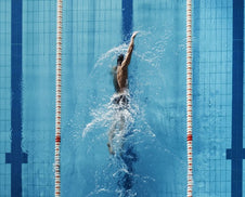 An Olympic swimmer swimming.