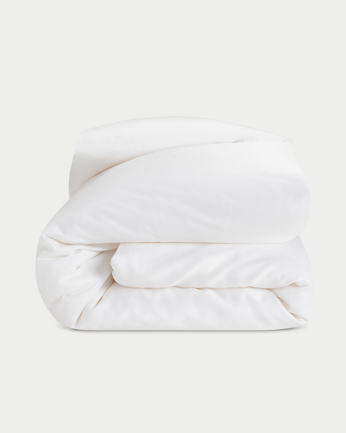 Silk comforter folded up with a white background |Filling:Silk