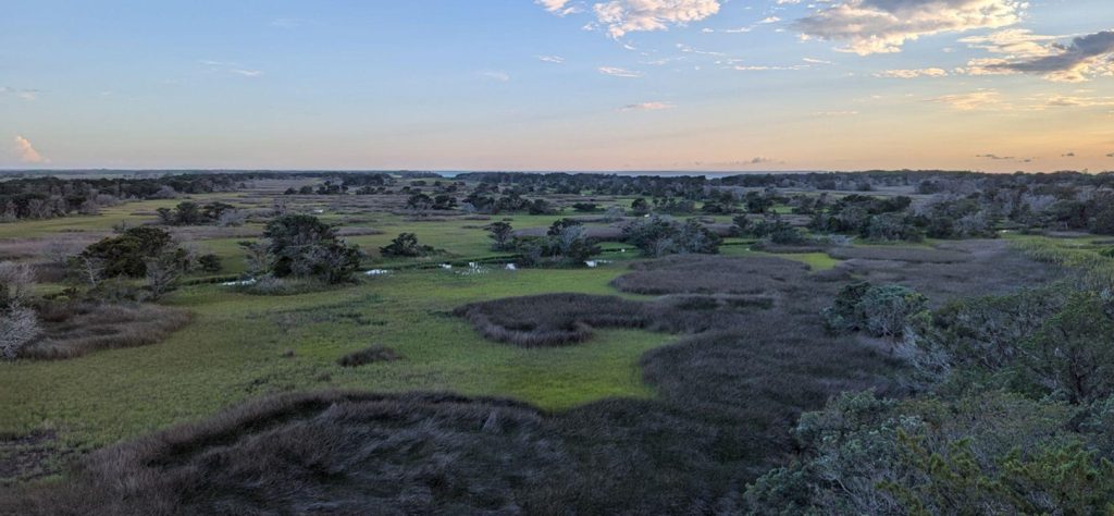 View overlooking Ocracoke Island wetlands as the sun is setting.