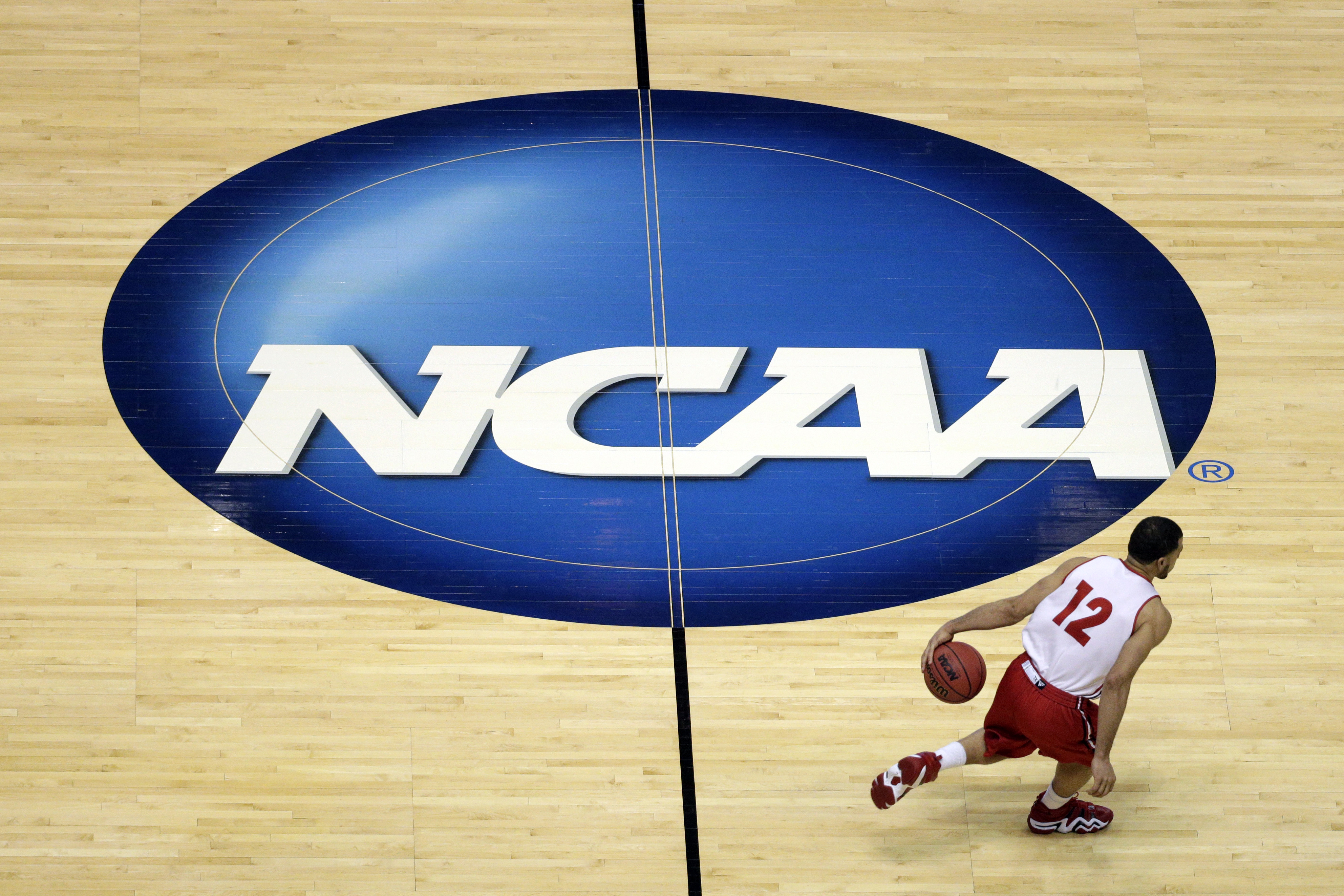The NCAA and the nation's five biggest conferences have agreed to pay nearly $2.8 billion to settle a host of antitrust claims.
