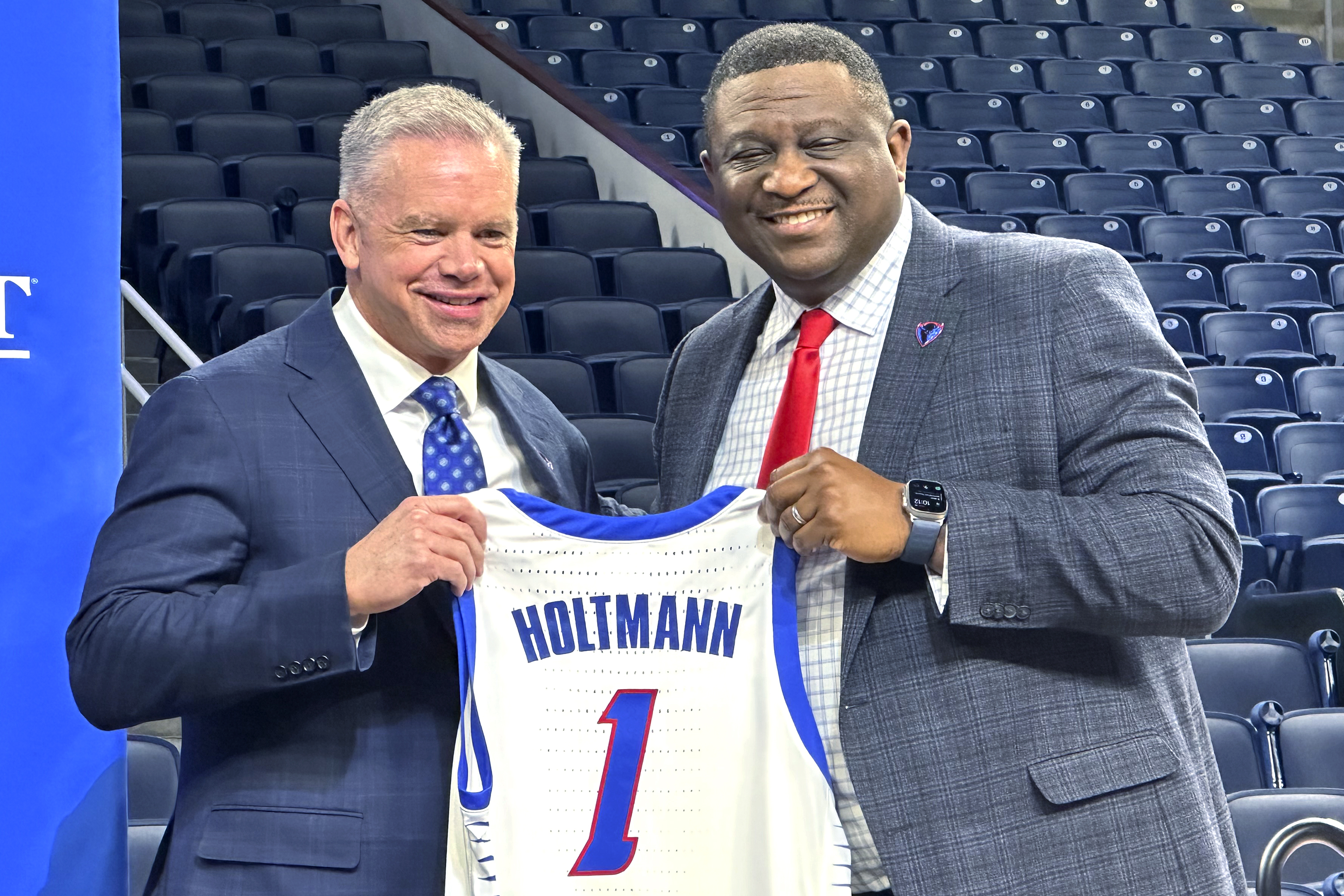 New DePaul coach Chris Holtmann (left) with athletic director DeWayne Peevy on March 18, 2024, at an introductory press conference at Wintrust Arena.