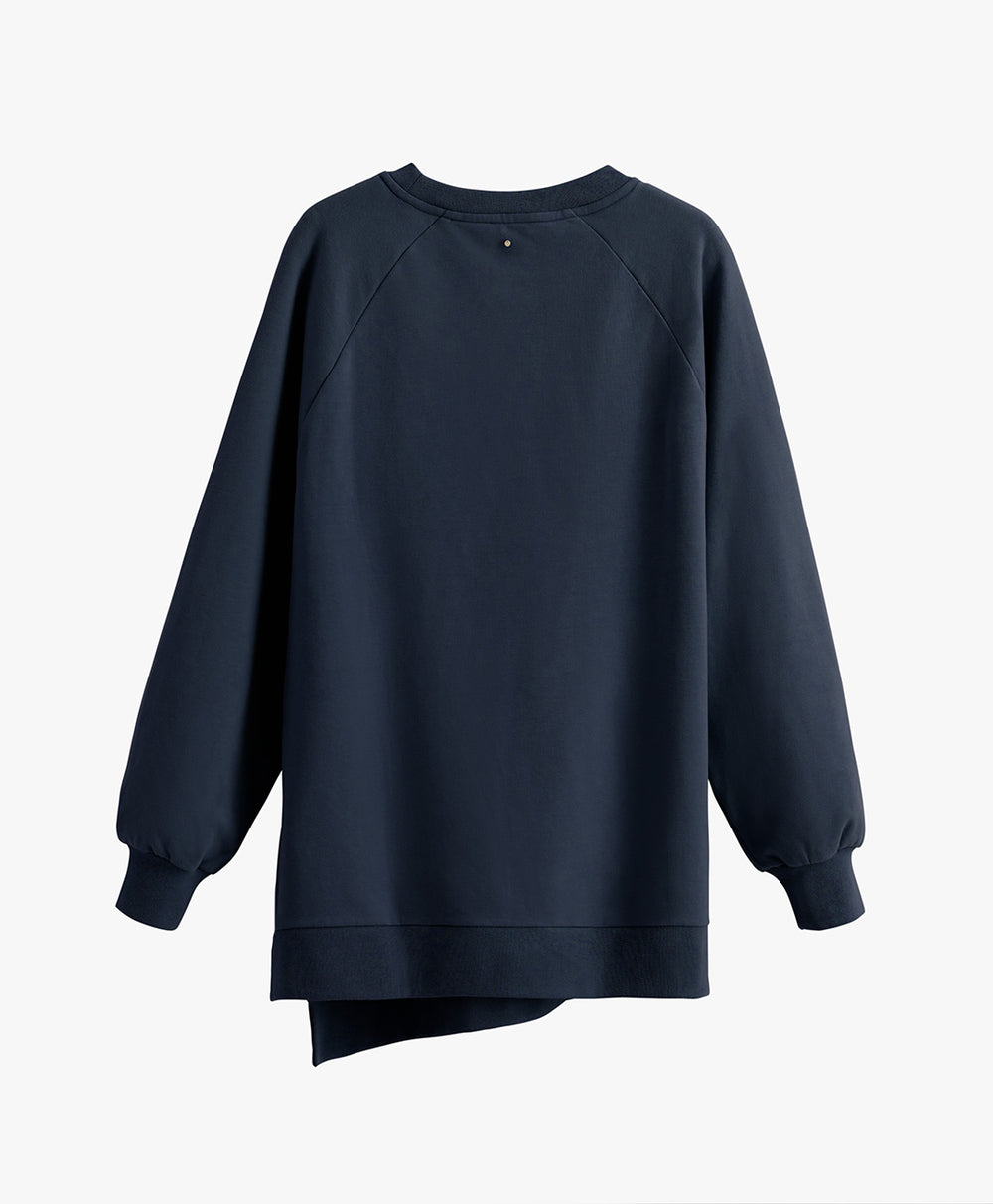 Long-sleeved crew neck sweatshirt on plain background.