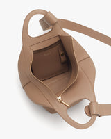 Open handbag with visible interior pocket and zipper.