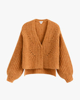 Knitted sweater with a V-neckline and button front.