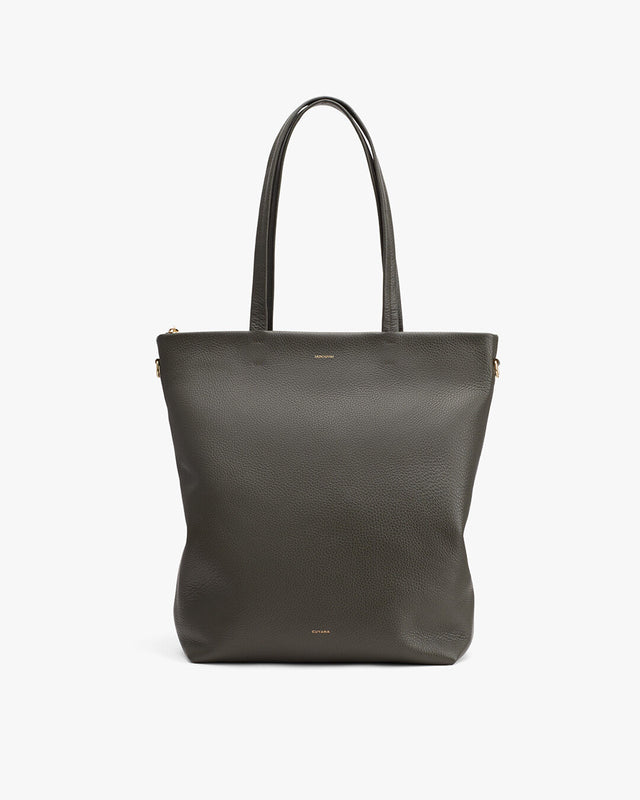 Tote bag standing upright with two handles.