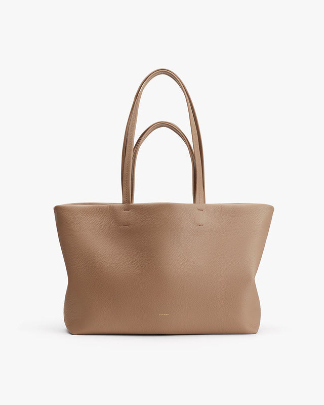 Large tote bag with two handles, standing upright.