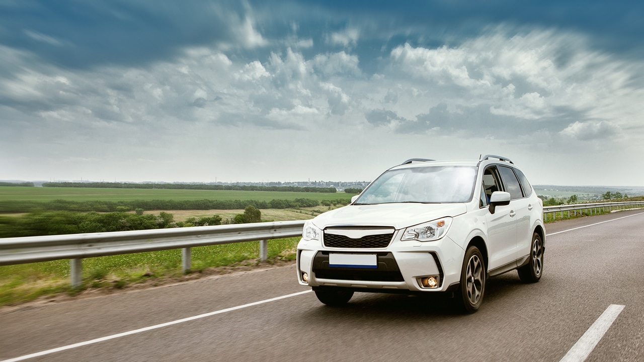 Modern new vehicle driving on the highway