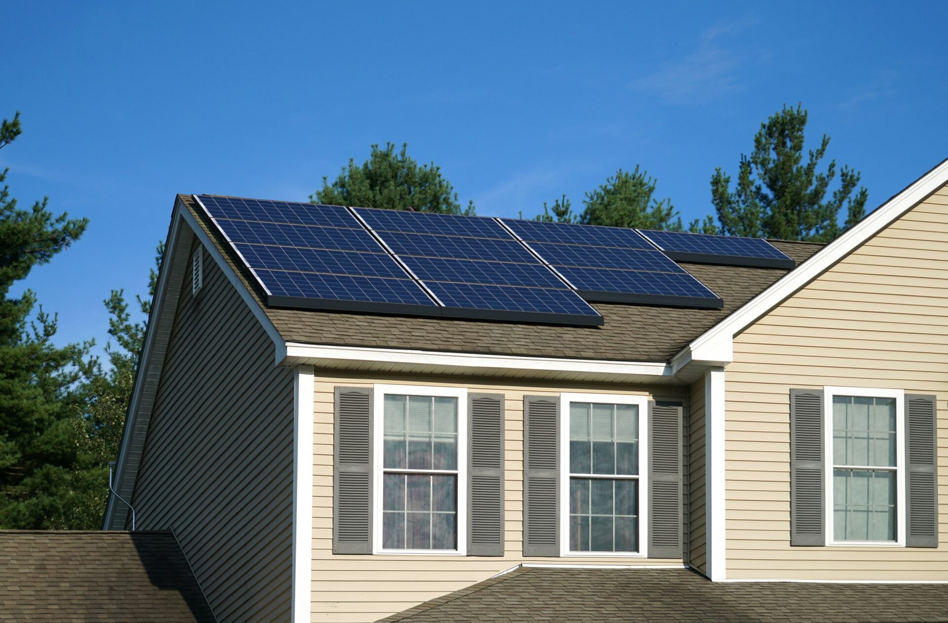 Solar panel installed on the roof of a residential house.