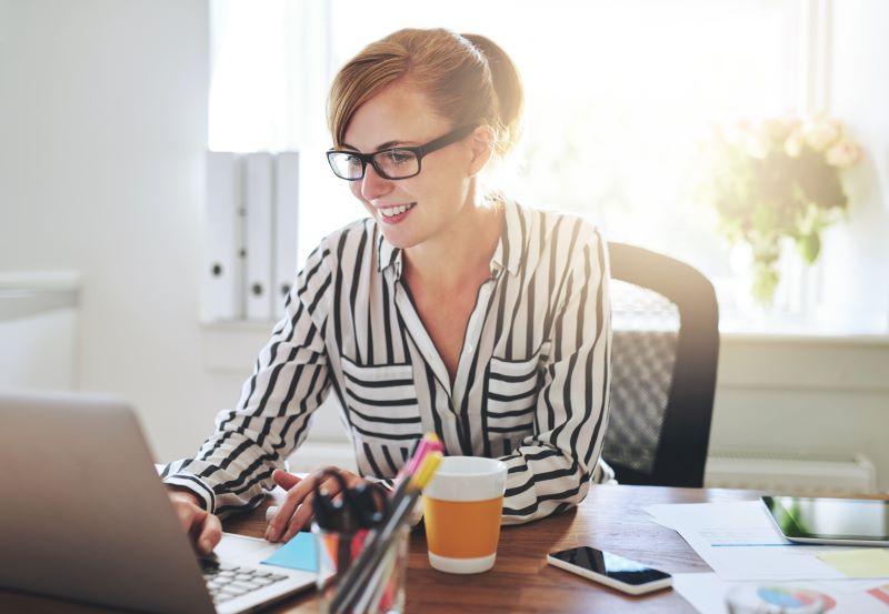 Woman learning about LLC structures on her computer