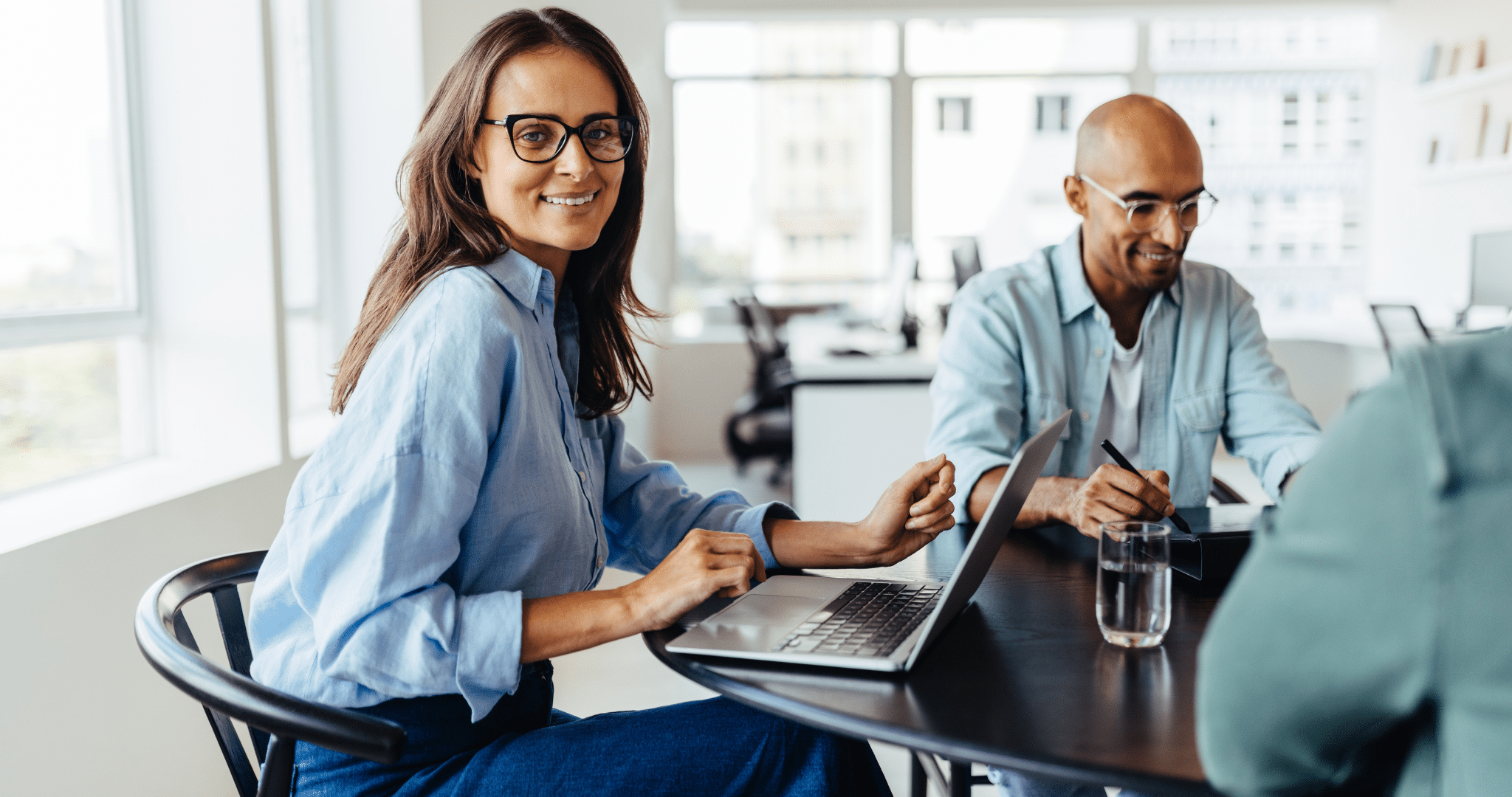 man and woman working at a desk