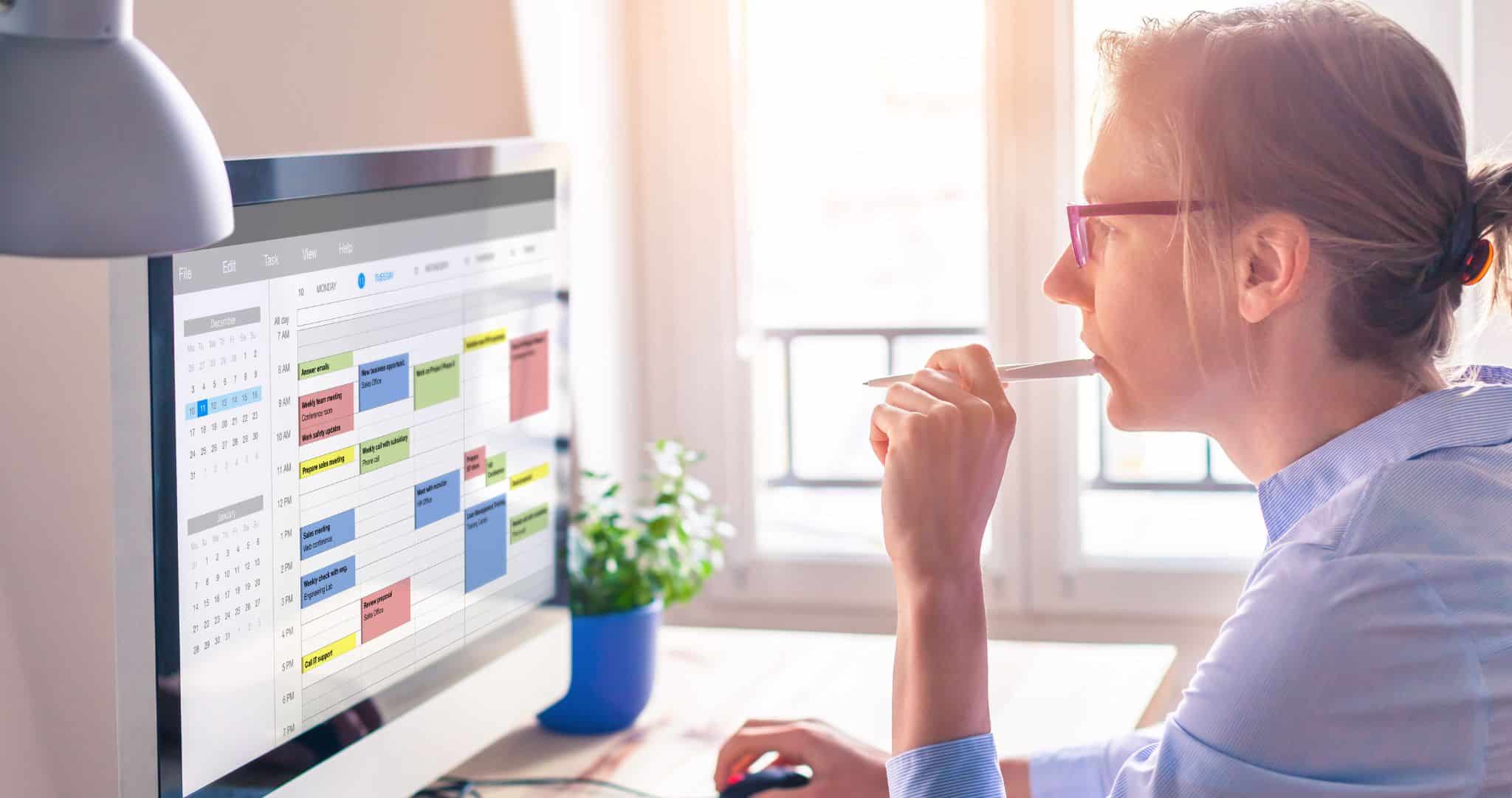 Person working in front of computer screen