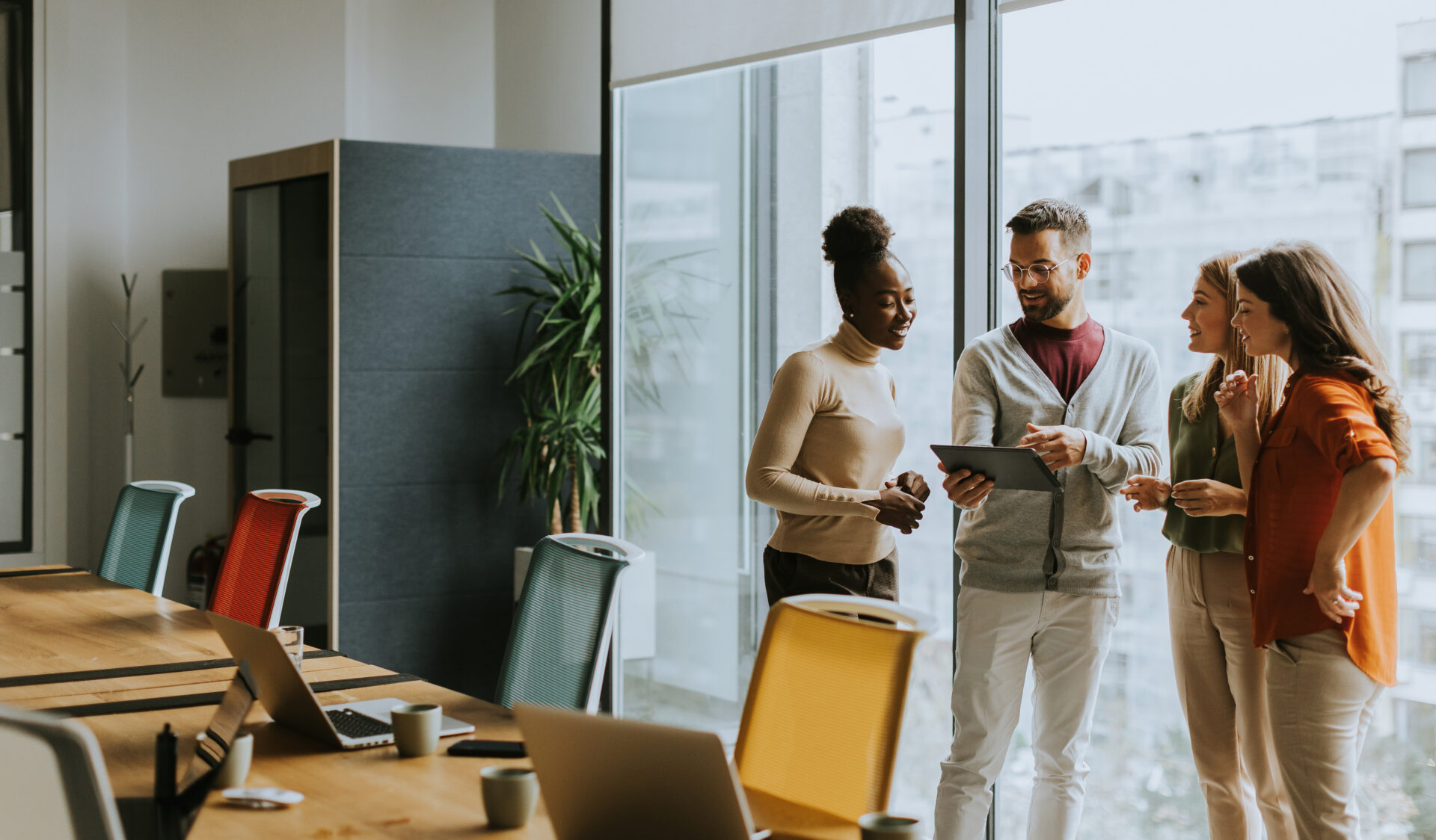 four employees in an office