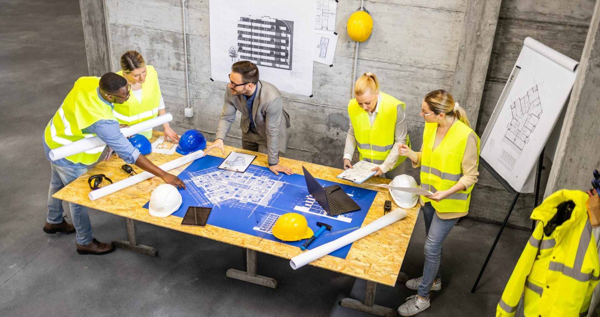 construction workers sitting around a table