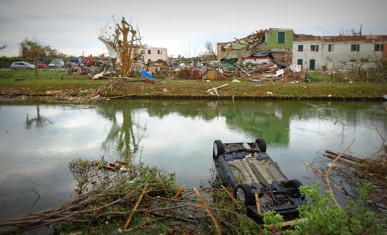 A town's aftermath of a tornado passing through.