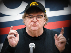 Michael Moore Calls For Joe Biden To Step Aside As Nominee, Says Letting Him Continue Presidential Campaign Is “Elder Abuse”