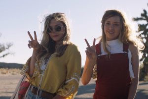 Elizabeth Olsen and Aubrey Plaza pose in the desert.