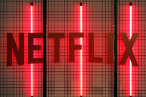 The Netflix logo on an illuminated background.