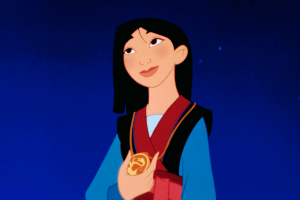 Mulan accepts a medal of honor.