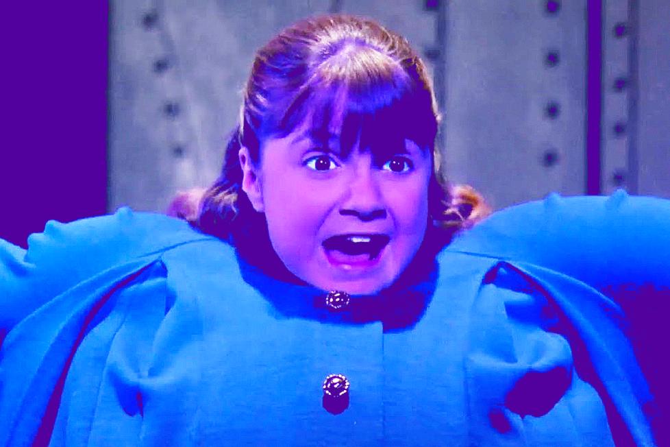 Violet Beauregarde inflates into a blueberry
