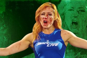 Becky Lynch bloody and triumphant