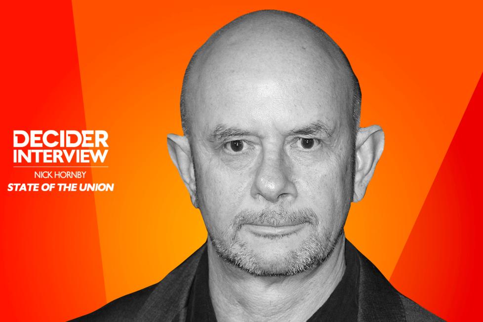 Nick Hornby in black and white on a bright orange background