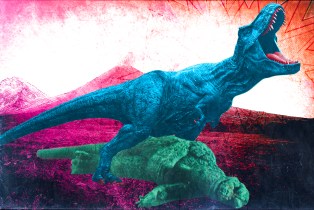 Photo illustration of T-rex from Jurrasic park series, standing over a defeated Godzilla, not something that would likely happen if they were to meet