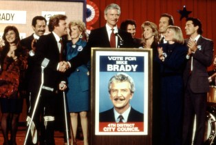 The Bradys on stage at political event