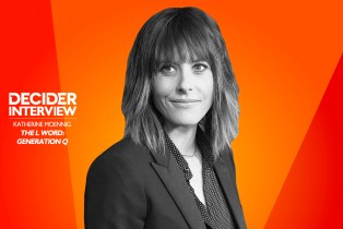 Katherine Moennig in black and white on a bright orange background