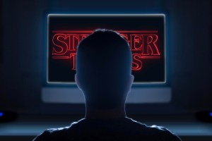 person in the dark watching stranger things