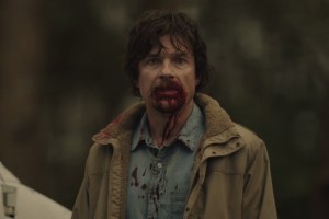 Jason Bateman with blood on his face in HBO's The Outsider